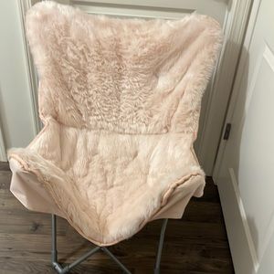 Fluffy pink sitting chair